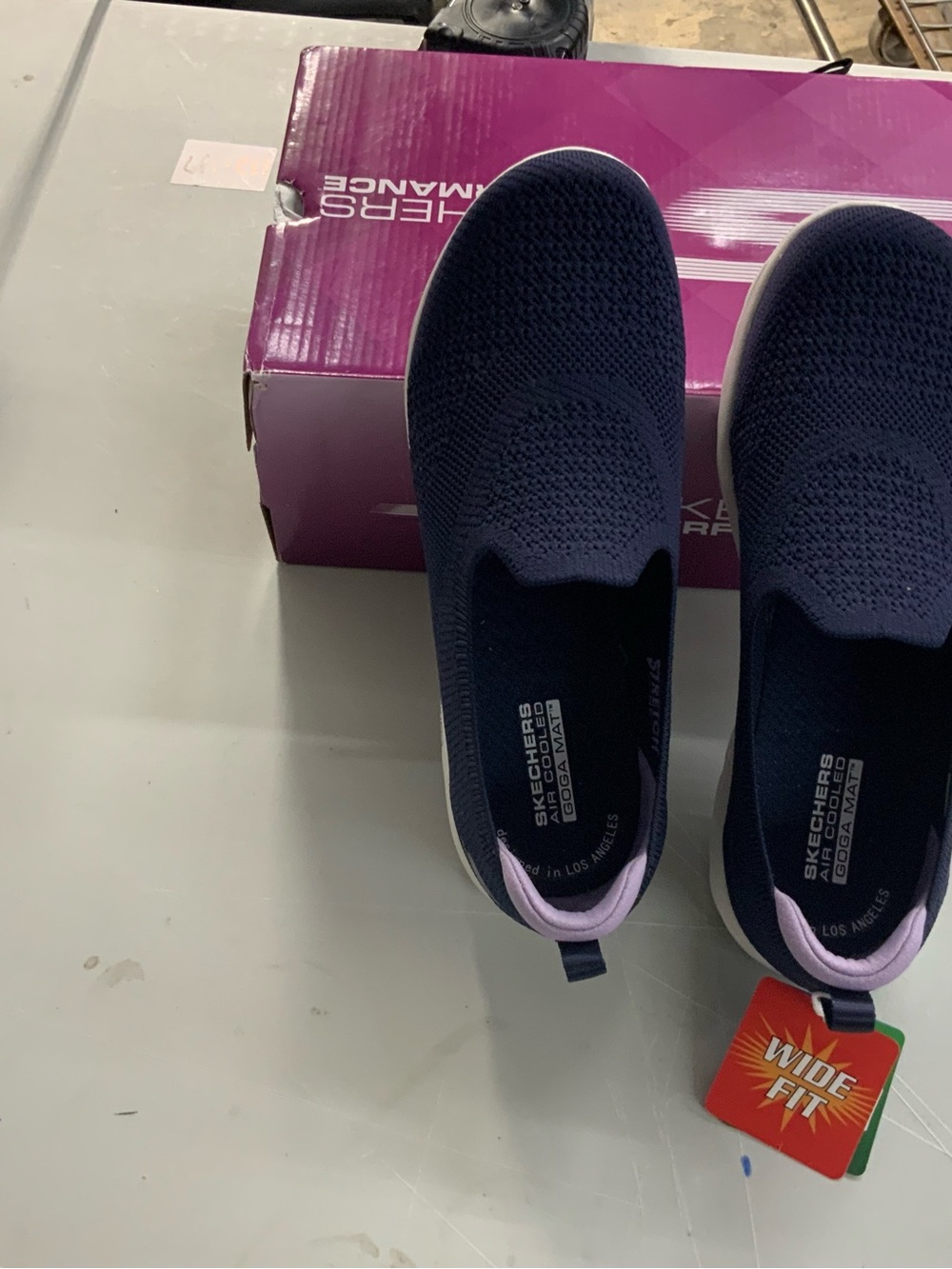 Skechers Navy Blue Slip-On Athletic Shoes with Light Pink Trim